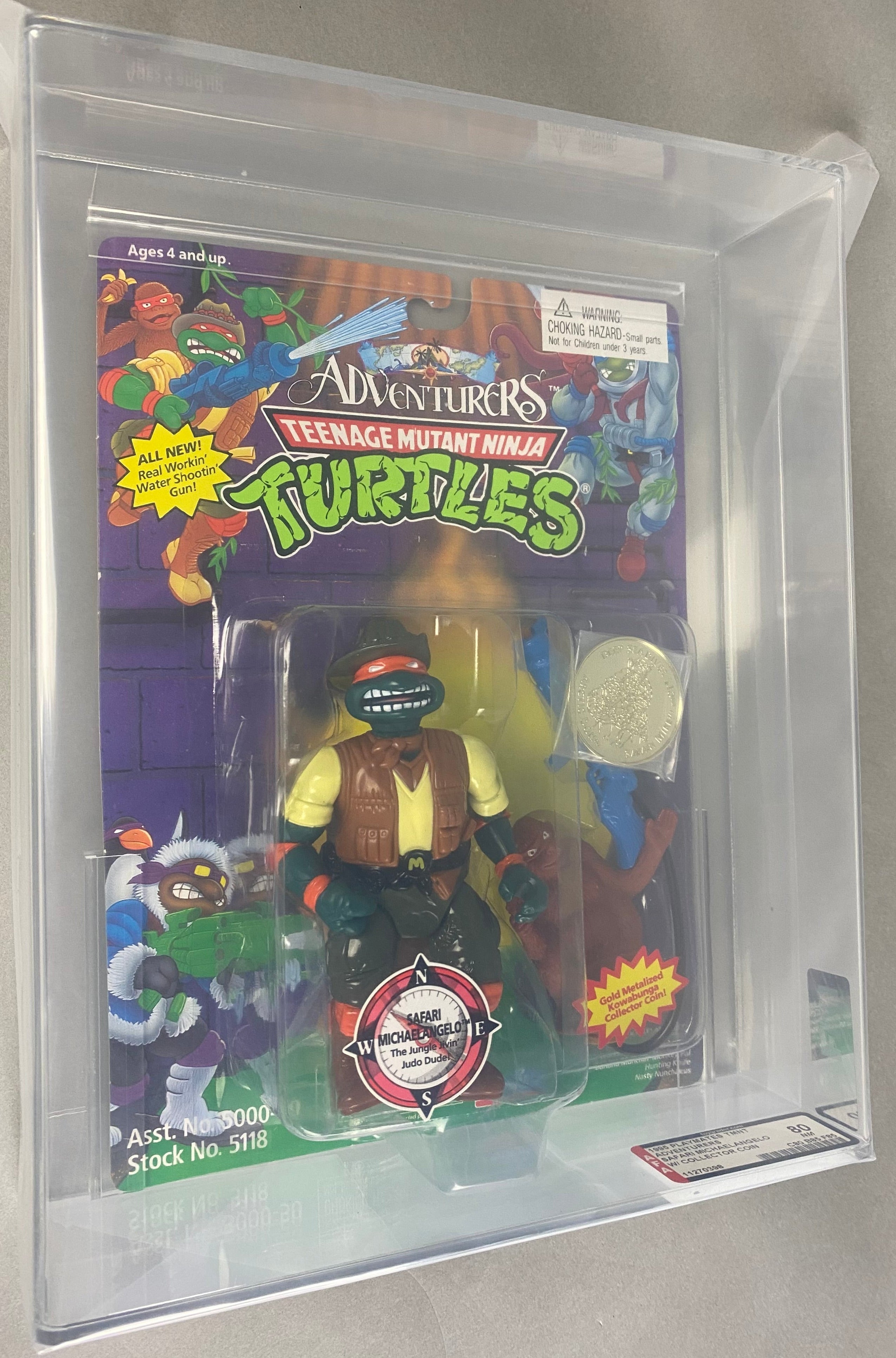 Teenage Mutant Ninja Turtles Safari Michaelangelo Adventurers boxed figure AFA graded 80. Front photo.